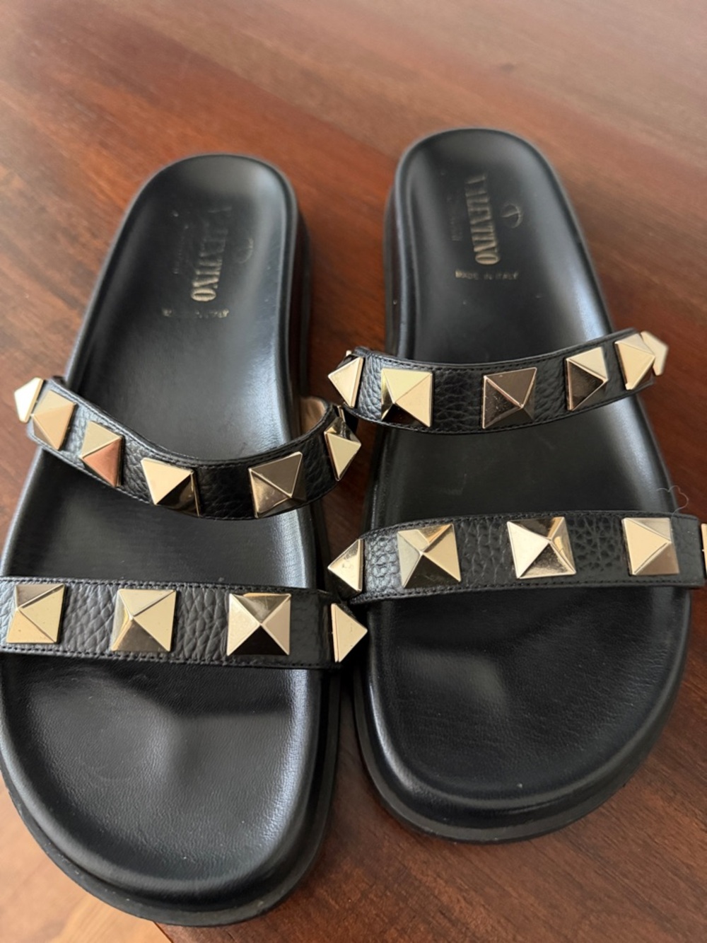 Valentino Black Leather Slides with Gold Pyramid Studs